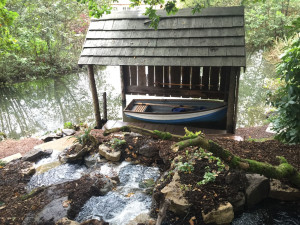 Boat house in timber with wooden pontoon designed and built by Evergreen Wales
