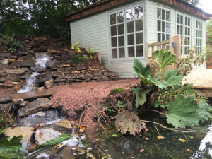 Water feature running alongside boat house