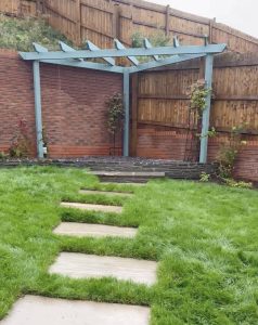 Sea green oak pergola in Caerleon garden design